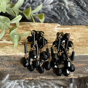 Vintage costume clip on earrings. Dangle black beaded amazing!